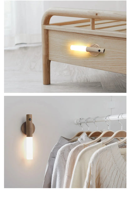 Wooden wall lights on a bed frame and clothing rack in a room.